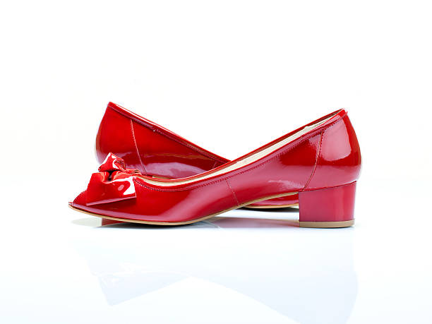 A pair of red patent high heels