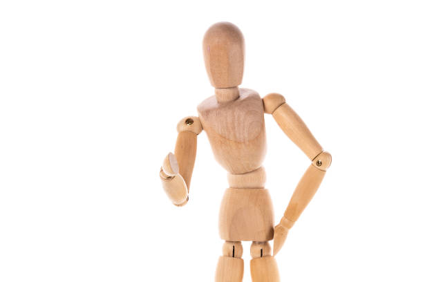 istock A wooden mannequin standing confidently with hands on hips. This versatile image can be used for various creative projects and design concepts. 1759127185
