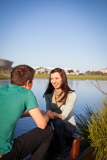 istock Young male proposes to his girlfriend 175913166