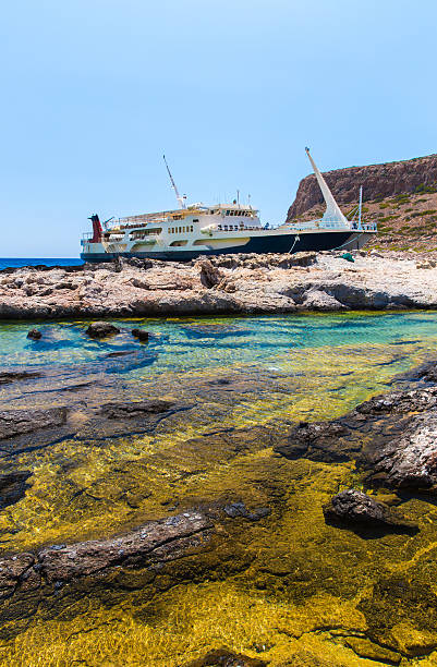 Balos beach and  Passenger Ship. View from Gramvousa Island, Crete in Greece.Magical turquoise waters, lagoons, beaches of pure white sand.