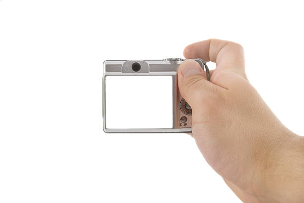 istock The digital camera in a hand isolated over white background 175913839
