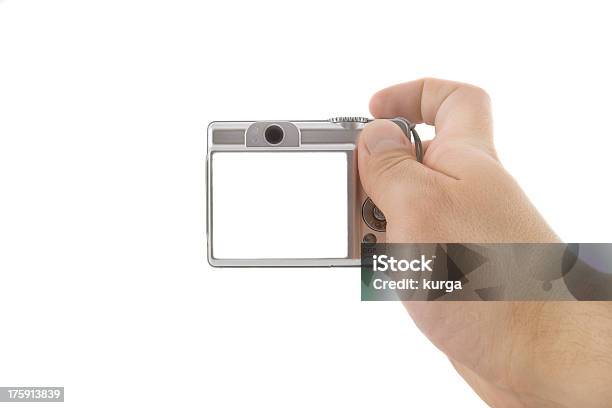 The Digital Camera In A Hand Isolated Over White Background Stock Photo - Download Image Now