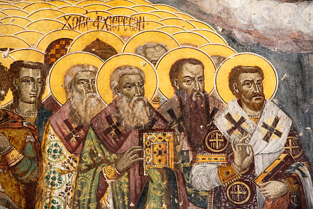 Thessaloniki, Greece - March 17, 2018: Ancient icon of Church Fathers from the church of Holy Trinity, 14th cent. The Three Hierarchs - Basil the Great,  Gregory the Theologian and John Chrysostom.