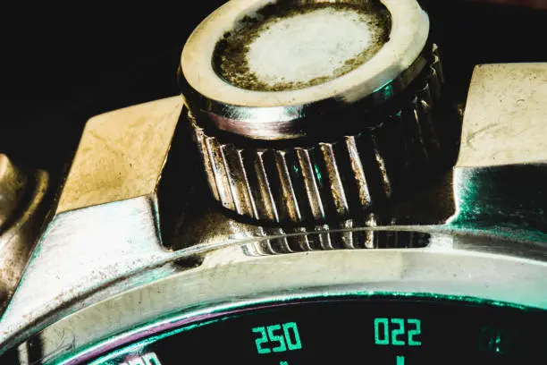 Photo of Closeup of the vintage watch crown. Macro shot.