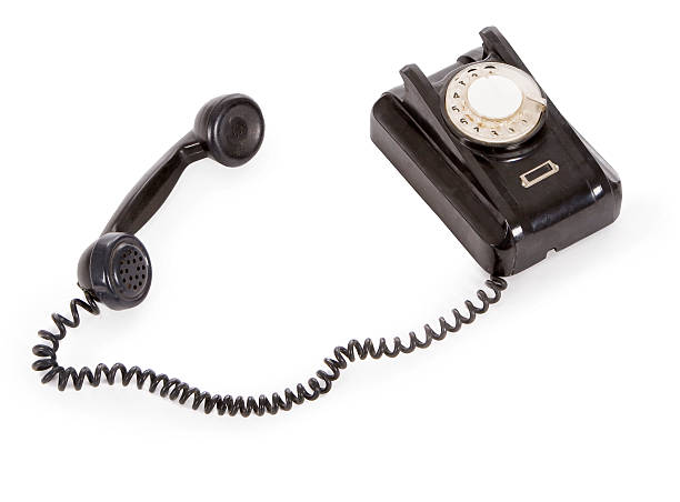 istock old black phone isolated over white 175917300