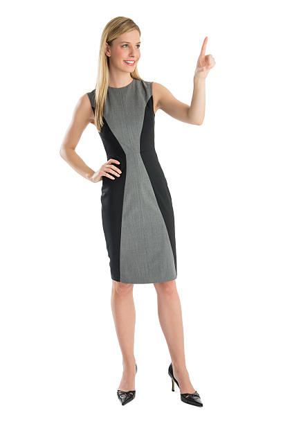 istock Businesswoman With Hand On Hip Pointing Upwards 175917932