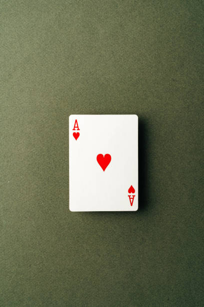 istock Ace playing card on green background close up 1759181377