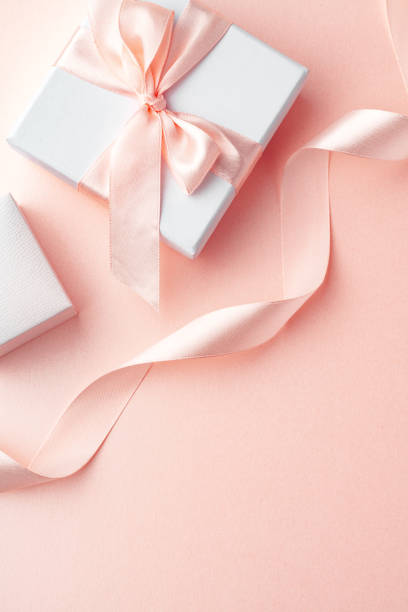 istock White jewelry boxes with silk ribbon close up 1759187913
