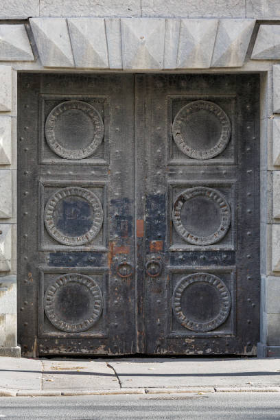istock An old wooden double door. Close-up. 1759196874