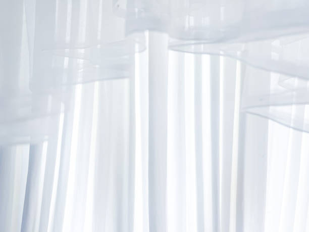 istock Background for design, white curtains, beautiful wallpaper, space for text. 1759233968