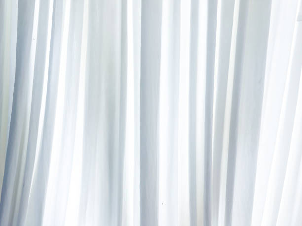 istock Background for design, white curtains, beautiful wallpaper, space for text. 1759234114