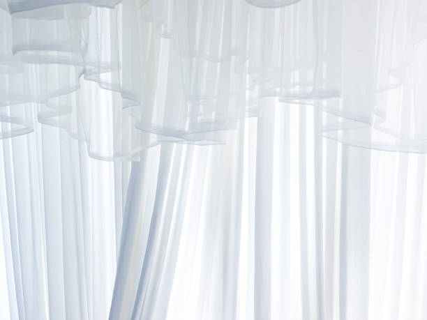 istock Background for design, white curtains, beautiful wallpaper, space for text. 1759234491