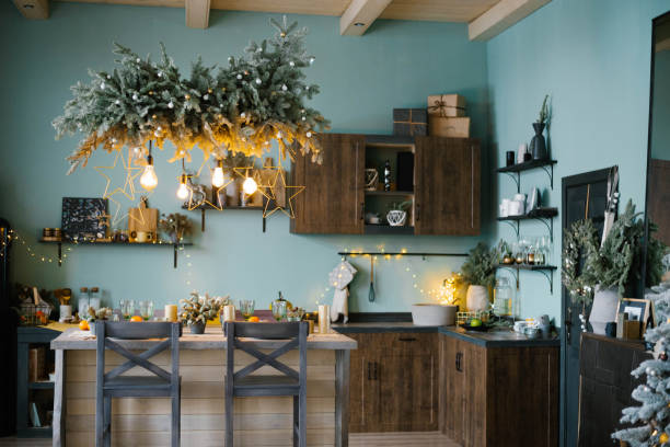 istock Mint blue kitchen interior and Christmas decor. Cooking dinner at home according to the concept of the kitchen 1759235042