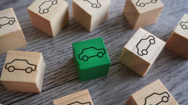istock Wooden blocks with car icon. 1759261947