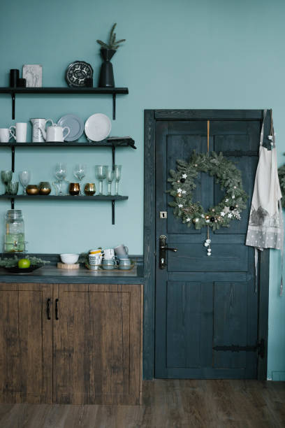 istock Mint blue kitchen interior and Christmas decor. Cooking dinner at home according to the concept of the kitchen 1759290877