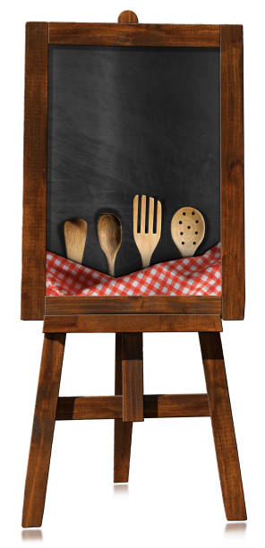 istock Empty Blackboard with Wooden Easel and Wooden Kitchen Utensils 1759294928