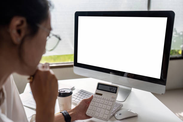 istock businesswoman accountant using calculator for checking financial data saving in office room 1759310155