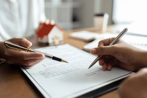 istock Real Estate Agent explain Property insurance and security concept about house to client before sign contract 1759310742