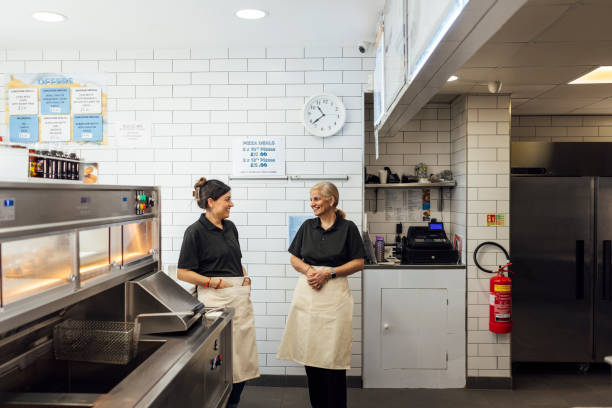 istock Chatting Together in the Chip Shop 1759341831