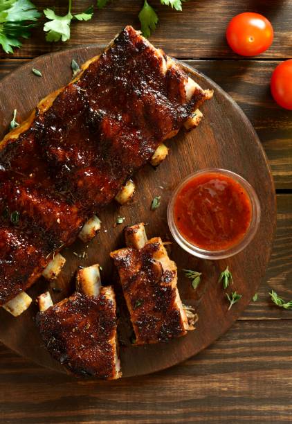 istock Barbecue pork ribs on cutting board 1759348047
