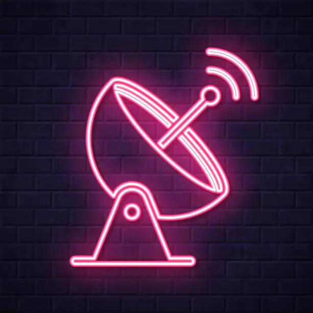 Vector illustration of Satellite dish. Glowing neon icon on brick wall background