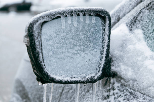 istock car covered with ice after snowstorm 1759377092