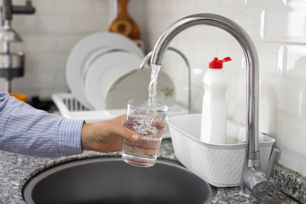 istock Pouring water into a glass 1759379274