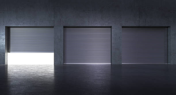 istock garages with metal shutters and concrete wall, light inside. 1759389535