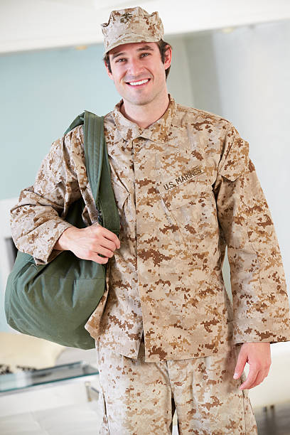 istock Male Soldier With Kit Bag Home For Leave 175939234