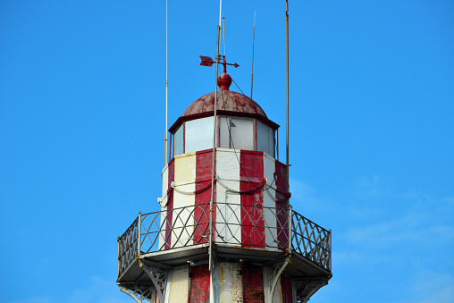 Georgetown, Guyana: Georgetown Lighthouse, built by the British on 1830, over an older Dutch structure -  octagonal tower made iconic by its red and white stripes that, unusually, are vertical - guides ships into the Demerara River from the Atlantic Ocean - Water Street