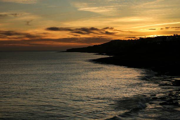 Beautiful and colorful sunset at Praia da Luz, Algarve, Portugal