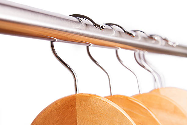 istock Empty raw of hangers isolated on white 175939877