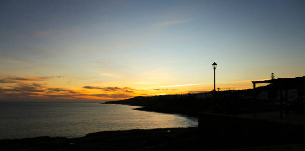 istock Beautiful sunset at Praia da Luz, Algarve 1759410991