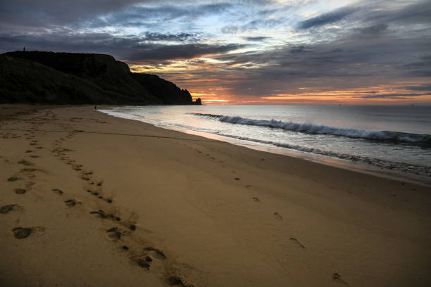 Beautiful sunrise at Praia da Luz, Algarve Beautiful and colorful sunrise at Praia da Luz, Algarve, Portugal luz solar stock pictures, royalty-free photos & images