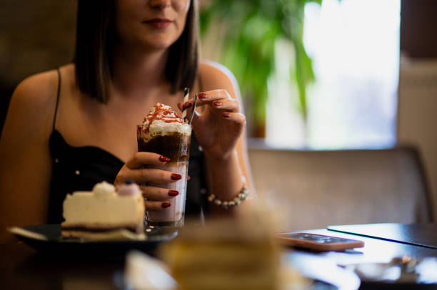 istock Coffee time with young woman 1759432365