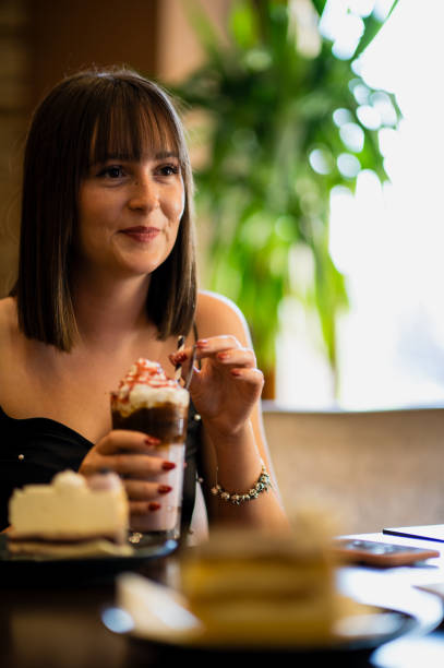 istock Coffee time with young woman 1759432381