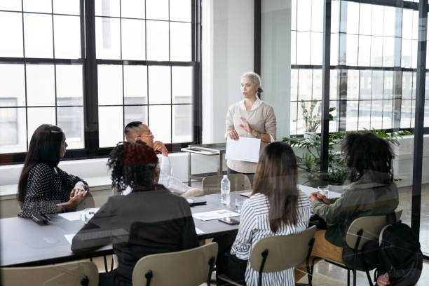istock Project team photographed through window during meeting 1759433493