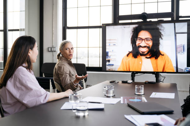 Cheerful project manager communicating on video call