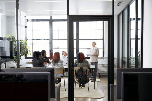 istock Creative director briefing project team in meeting room 1759433501