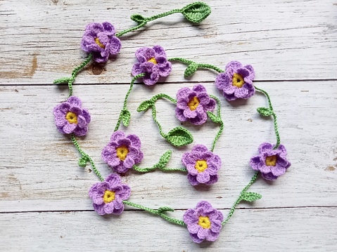 crochet garland handmade flower pattern mushrooms multicolor background texture