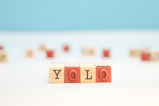 YOLO Acronym On Wooden Cubes.
You Only Live Once