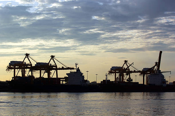 istock port warehouse with container cargo and crane bridge 175944914