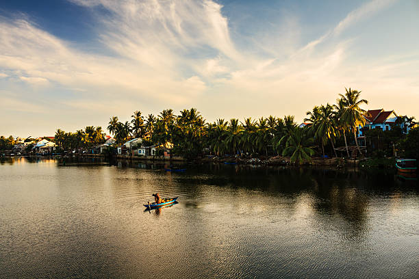 Fishing Fishing at Thu Bon river, Cua Dai, Quang Nam, Vietnam thu bon river stock pictures, royalty-free photos & images