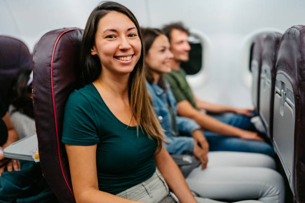 istock Young Woman In An Airplane 1759456220