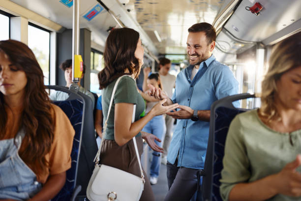 istock Happy couple talking while traveling by bus. 1759456809