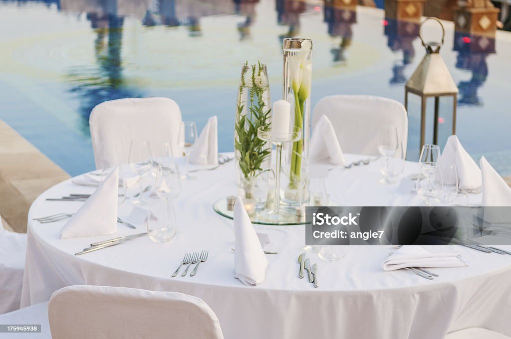 Overview of elegant white wedding reception table setting Romantic wedding reception Wedding Stock Photo