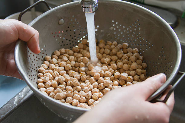 Washing Garbanzon Beans stock photo