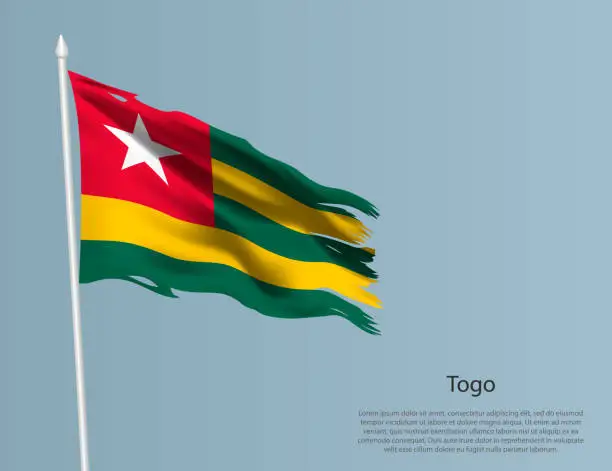 Vector illustration of Ragged national flag of Togo. Wavy torn fabric on blue background