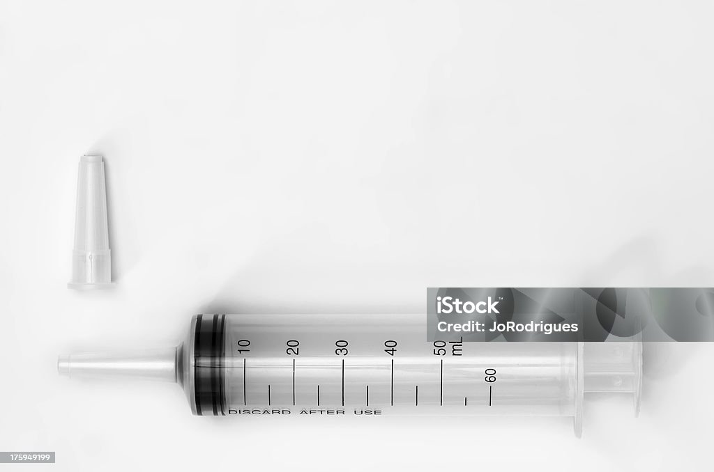 大きな注射器キャップ付き - インフルエンザワクチンのロイヤリティフリーストックフォト