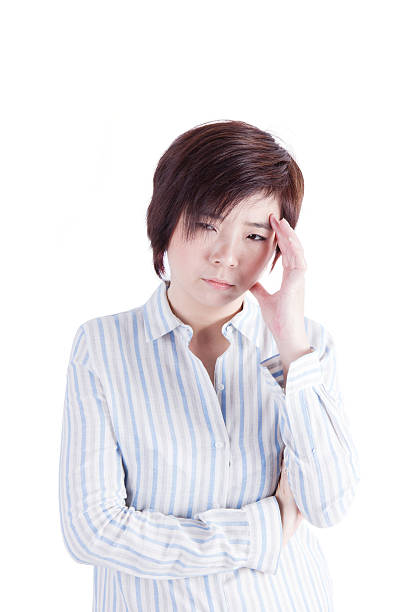 istock asian woman got headache on white background 175949558